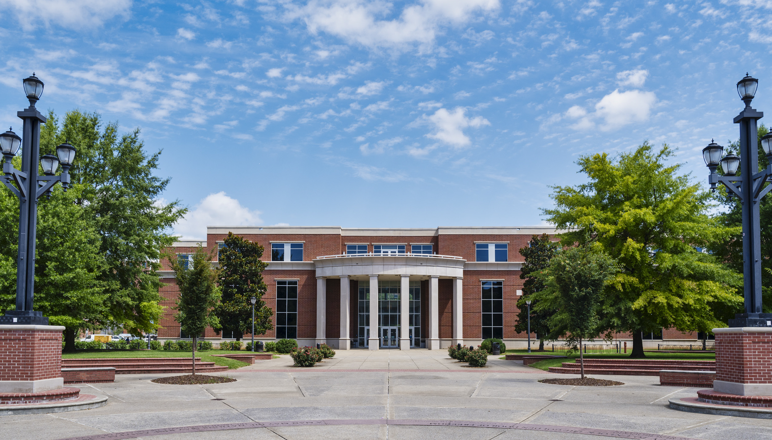 The Business and Aerospace building as seen from the MTSU Campus quad seal.